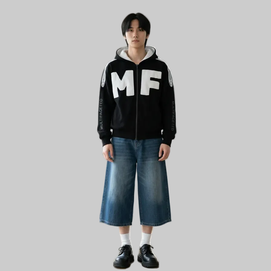 Black and white zippy hooded jacket, with large MF letters sewn on the front.