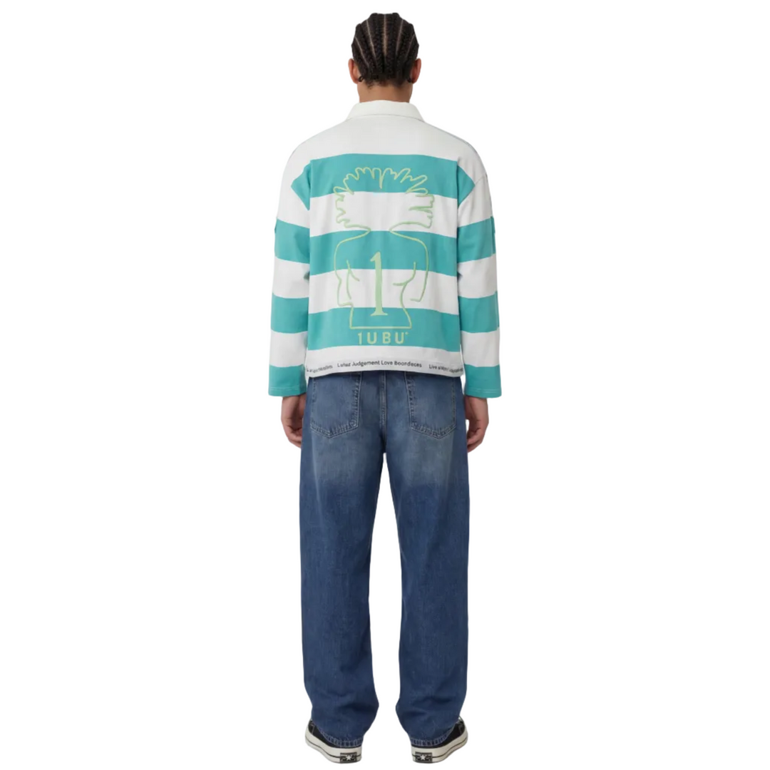 Person wearing a striped shirt and jeans on a white background