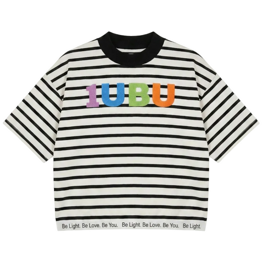 Black and white striped t-shirt with colorful text on a white background