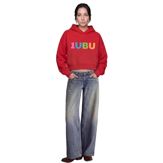 Person wearing a red hoodie with '1UBU' logo and blue jeans on a white background