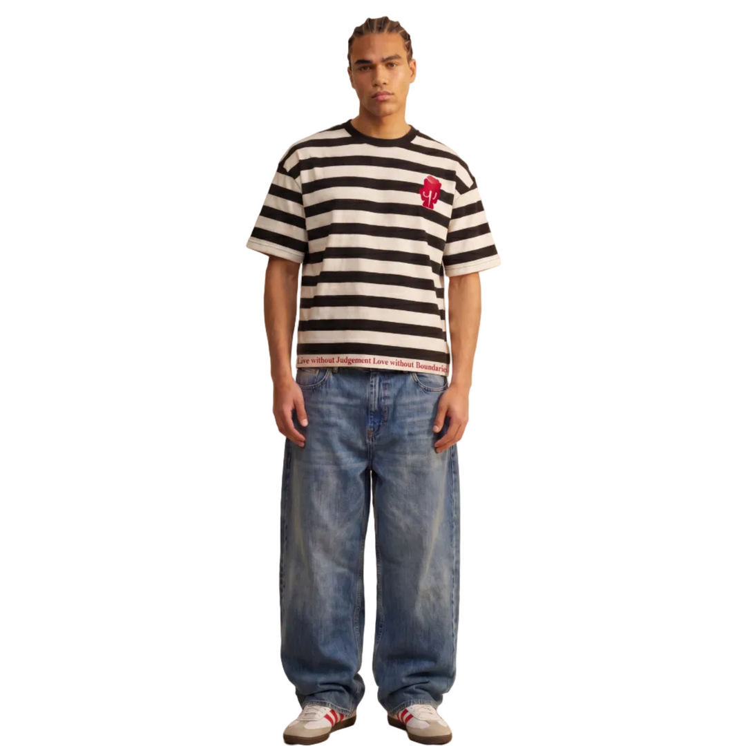 man wearing 1UBU strpe Tee